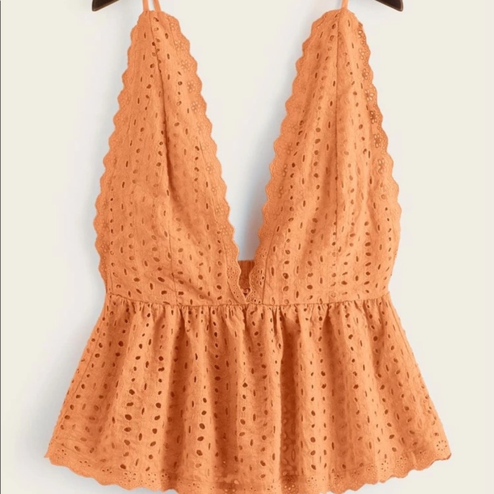 Orange low cut shirt